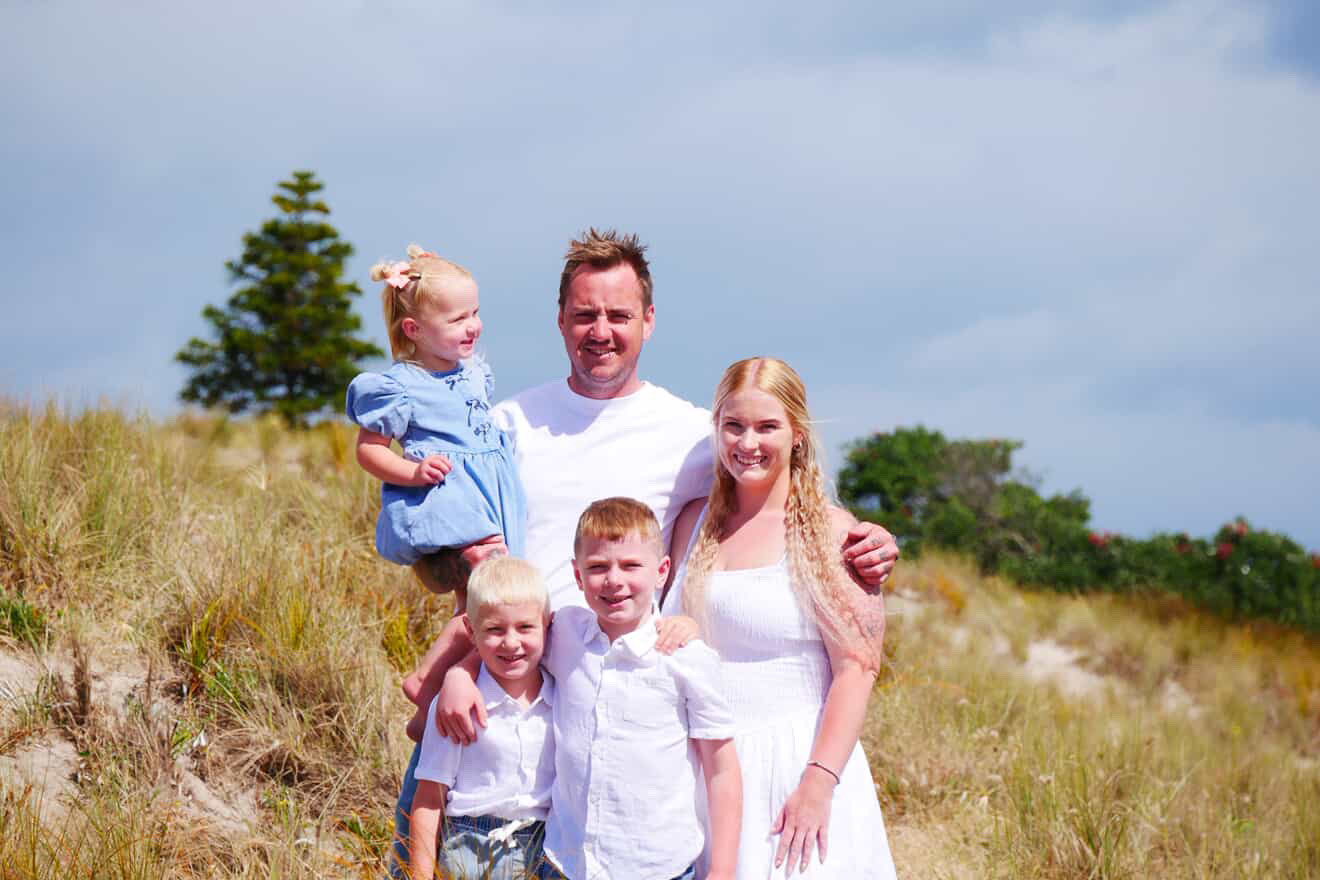 Family portrait in coastal grass